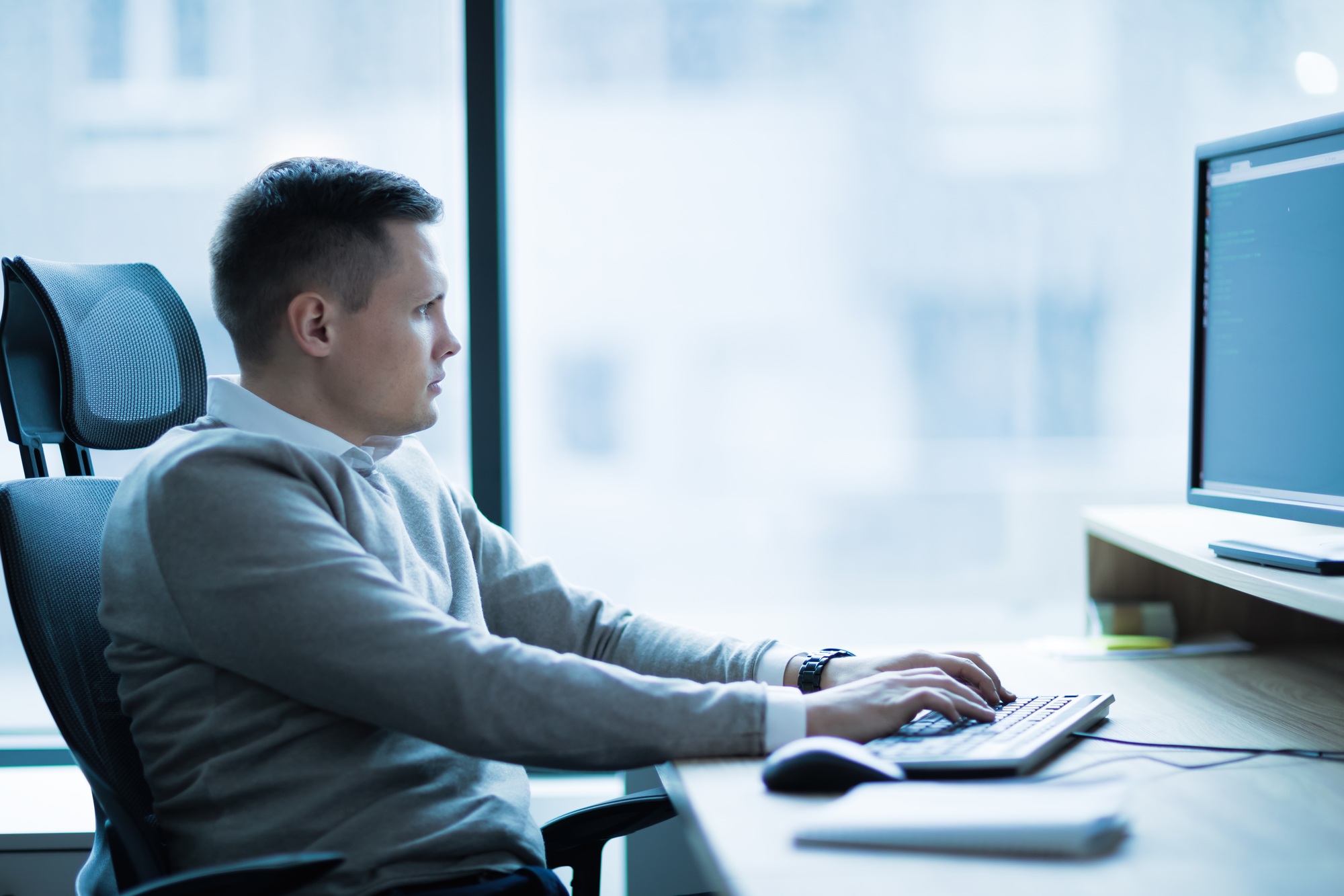 Professional software developer working in office